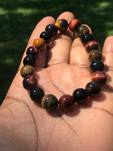 Yellow/red tigereye and onyx elastic bracelets