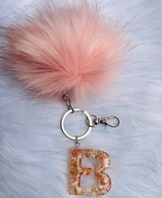 Load image into Gallery viewer, Flower (plum) pompom keychain
